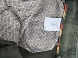 a close up of a shirt with a label on it
