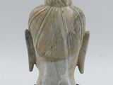 an image of a statue of a woman with a bun on her head