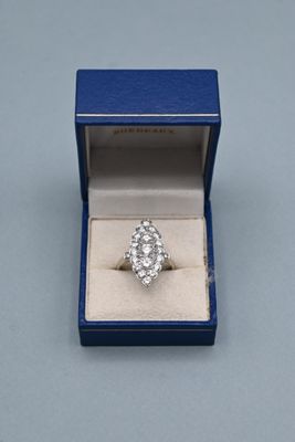 an image of a diamond ring in a blue box