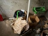 a trash can in the corner of a room with a trash can in the corner