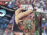 a lot of comic books on the table