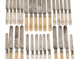 a set of eight silver and wood handled knives
