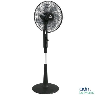un ventilateur noir posé sur un pied métallique