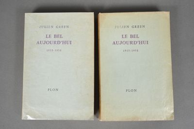 two books sitting on top of a table next to each other