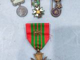 a lot of medals that are on a table