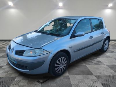 a picture of a blue car parked in a garage