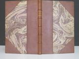a brown book with a marble design on it