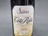 a bottle of wine that is sitting on a table