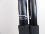 two speakers that are sitting on top of a table