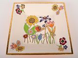 a picture of a picture of flowers and butterflies on a plate