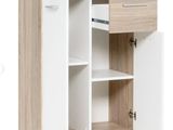 a close up of a cabinet with a drawer and shelves