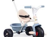 un tricycle pour enfant muni d'un guidon