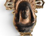 an image of a statue of a woman with a crown on it ' s head