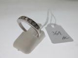 a ring that is sitting on top of a white table