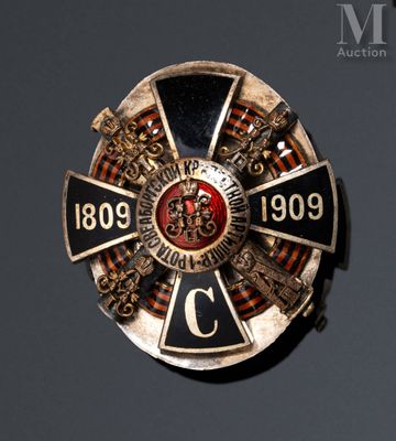 an image of a badge with a cross on it