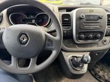 the interior of a car with a steering wheel and dashboard controls
