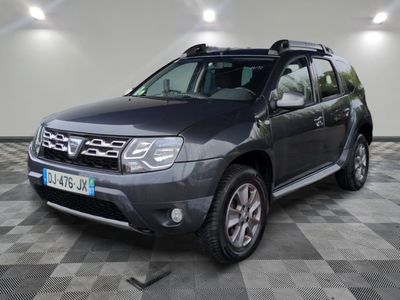 a picture of a grey dacia parked in a garage