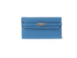a blue leather wallet with a metal clasp on the front