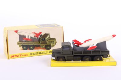 a toy truck with a missile on top of it