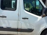 a white van that is parked in the parking lot