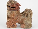 une image représentant une statue de chien sur fond blanc