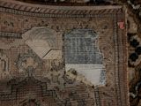a piece of fabric that has been torn off and is laying on the floor