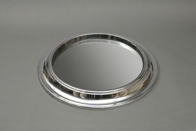 Miroir circulaire en métal chromé à bordure moulurée