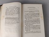 an open book that is sitting on a table
