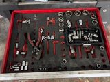 a tool box with tools in it on the floor
