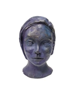 purple sculpture of a woman ' s head with a turban on her head