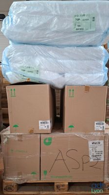 many boxes stacked on top of each other on a pallet