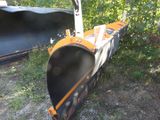 an image of a plow blade laying on the ground
