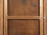an old wooden picture frame with a small window on top of it
