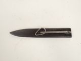 a knife with a metal handle on a white surface