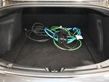 a trunk of a car with a bunch of wires in it