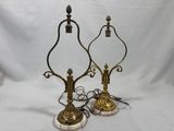 pair of antique brass candlesticks with marble bases