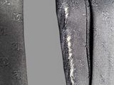 a close up of a pair of shoes with holes on them