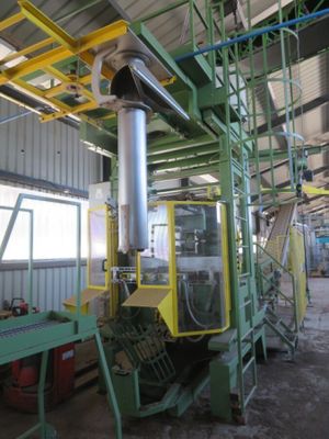 a picture of a machine that is working on a piece of machinery