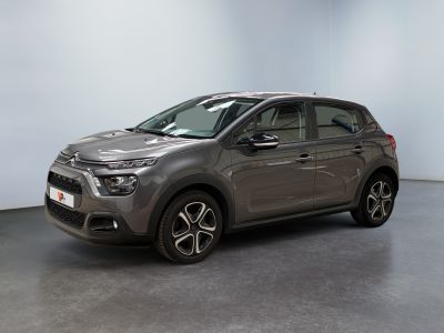 the grey citrole is parked in a large room