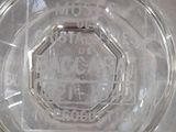 a clear glass bowl with a stop sign on it