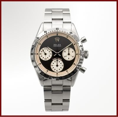 une image représentant une montre-bracelet avec un cadran noir et un bracelet argenté