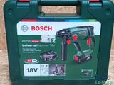 a close up of a box with a cordless hammer in it