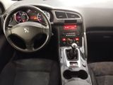 a dashboard of a car with a steering wheel and dashboard controls