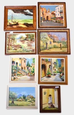 several framed paintings of different types and sizes hang on a wall