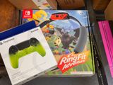 a box of nintendo wii game controllers and a box of nintendo wii controllers