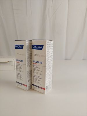 two boxes that are sitting next to each other on a table