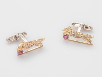 deux paires de boutons de manchette en or et diamants