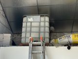 a ladder that is going up to the ceiling