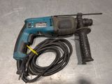 a drill that is sitting on a table
