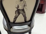 a chair with a picture of elvis presley on it